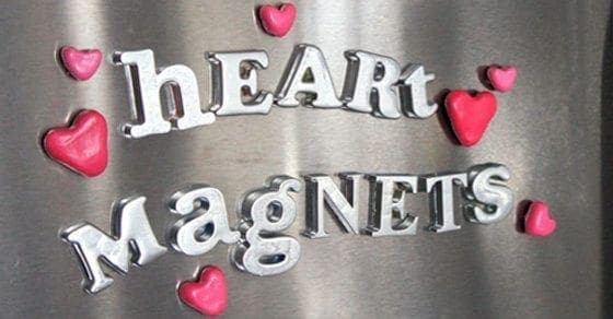 Heart Magnets craft in pink and silver on a metallic surface.