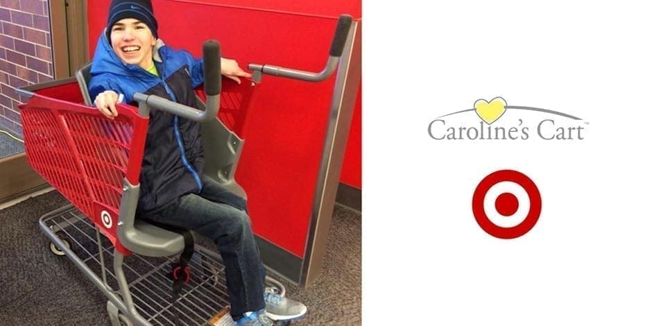A person sits in a shopping cart designed for those with disabilities, next to the Caroline's Cart and Target logos.