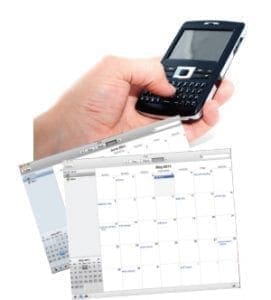 Hand holding a PDA phone above calendar screens.