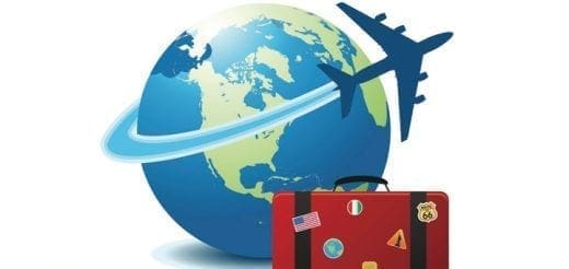 Globe with airplanes and a suitcase.