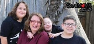 Jami De La Cerda with her three children, including one with Down syndrome.