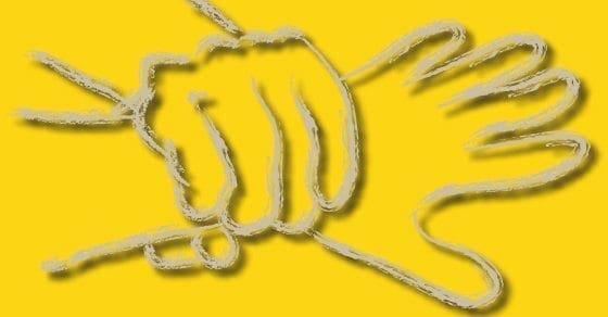 Outline of a hand tied with a rope on a yellow background.
