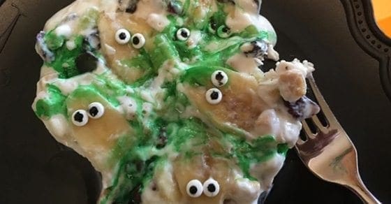 Spooktacular BOO BARK breakfast yogurt with candy eyes and green drizzle