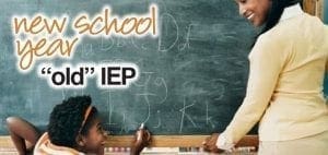 Teacher and student at a chalkboard with text "new school year 'old' IEP