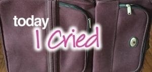 Suitcase with "today I cried" text overlaid