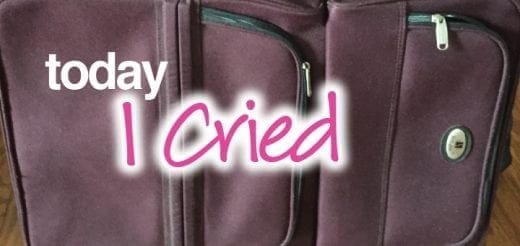 Suitcase with "today I cried" text overlaid