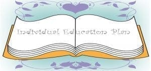 Open book with "Individual Education Plan" written on the pages.