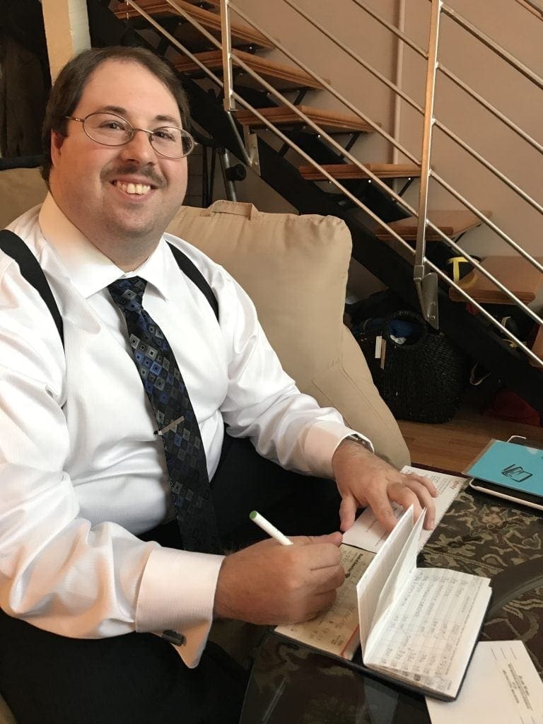 Blair paying bills.