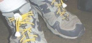 Gray New Balance sneakers with yellow elastic Locklaces