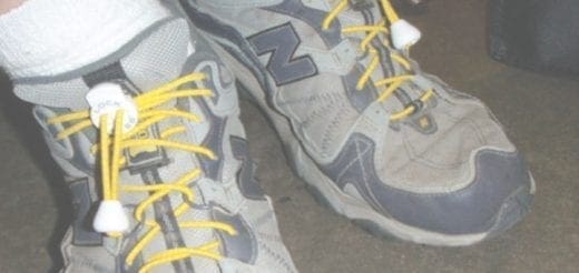 Gray New Balance sneakers with yellow elastic Locklaces