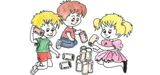 Three children stacking aluminum cans to build a tower.