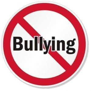 A red circle with a diagonal line through it over the word "Bullying.