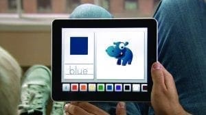 Tablet displaying an app with a blue square, the word "blue," and a cartoon blue hippo.