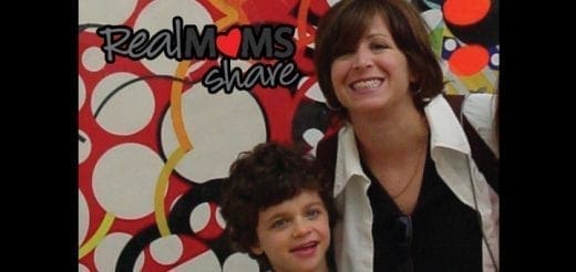 Michele Gianetti and son smiling.