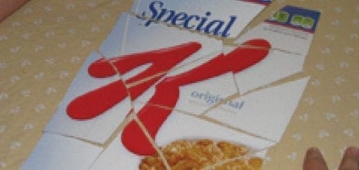 A Special K cereal box cut into puzzle pieces.