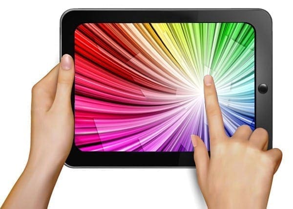 Tablet with colorful radiating lines displayed, being held by two hands.