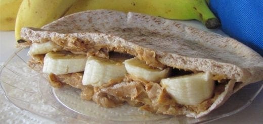 Pita pocket with peanut butter and banana slices.