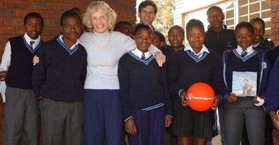Eunice Kennedy Shriver poses with a group of students.