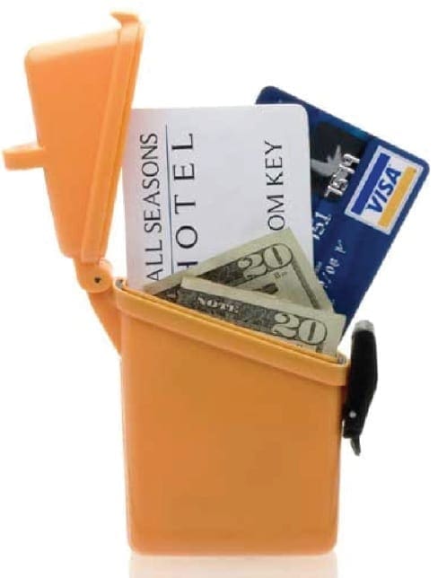 Orange waterproof case holding a hotel key card, a Visa card, and US currency.