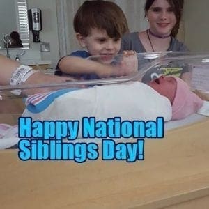 Malachi Roth with his newborn sibling and an older sibling.