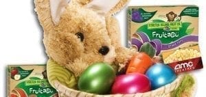 Easter basket with a plush bunny, colorful eggs, and fruit snacks.