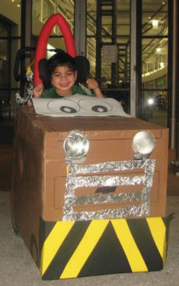 Marcos wearing a Mater costume.