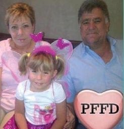 The Beukes family poses for a photo.