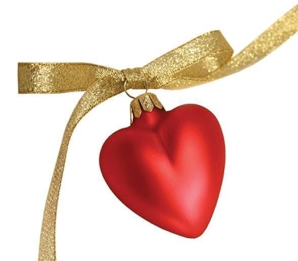 Red heart ornament with a gold ribbon.