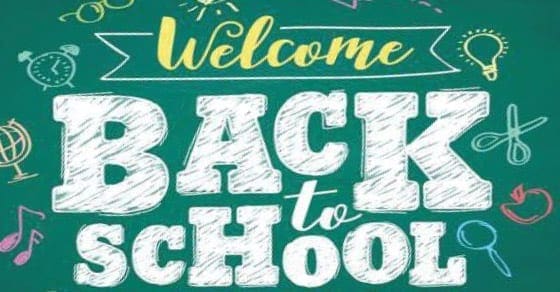 Welcome back to school text with school supplies on a chalkboard.