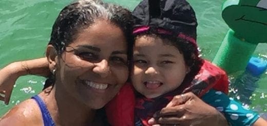 Ivanna Fajardo and Neysha Miranda smiling in the water.