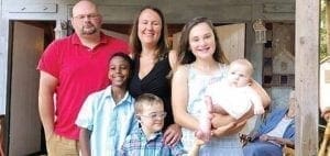 Erin Harris and family pose for a photo.