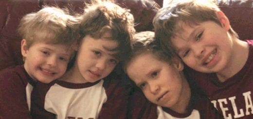 Four children posing for a picture