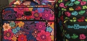 Suitcases with floral and Walt Disney World patterns