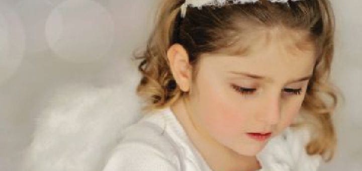 Alyssa Grace Lee in angel costume.
