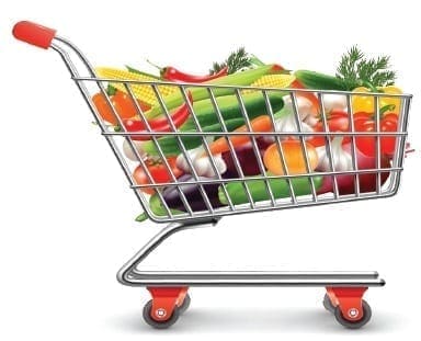 Shopping cart overflowing with fresh vegetables