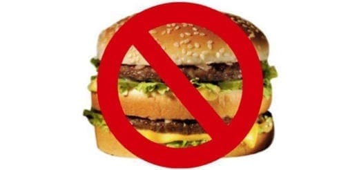 Double cheeseburger with a red prohibition sign over it.
