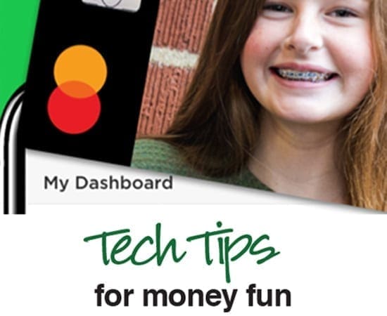 A smiling girl with braces looks at the camera next to a black device with two circles.
