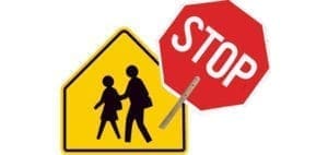 School crossing sign with a stop sign.