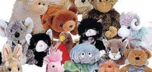 Collection of assorted stuffed animals including a koala, cat, and bear.