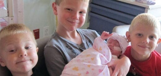 Joy Degl, 2019 Cover Winner, with her brothers.