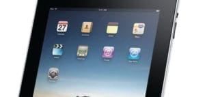 Tablet displaying various app icons including calendar and contacts.