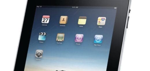 Tablet displaying various app icons including calendar and contacts.