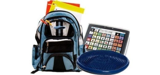 Backpack with school supplies, tablet, and balance disc