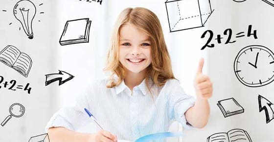 A smiling girl gives a thumbs up while drawing math problems.
