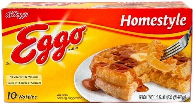Box of Homestyle Eggo waffles with a waffle on a plate topped with syrup and butter.