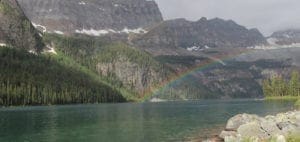Boom Lake with mountains and a rainbow.