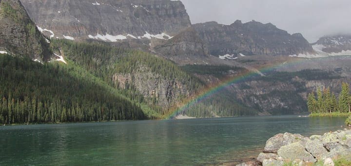 Boom Lake with mountains and a rainbow.