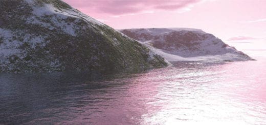 Snow-covered hills meet a calm, pink-hued sea at sunrise.