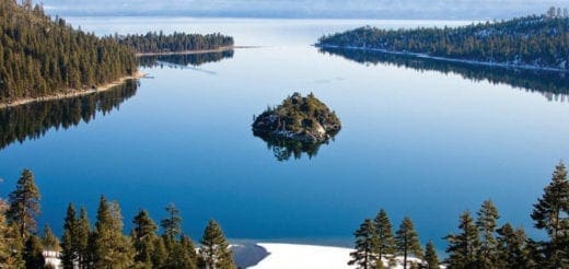 Island in Lake Tahoe surrounded by pine trees