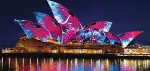 Sydney Opera House illuminated with colorful lights during Vivid Sydney.